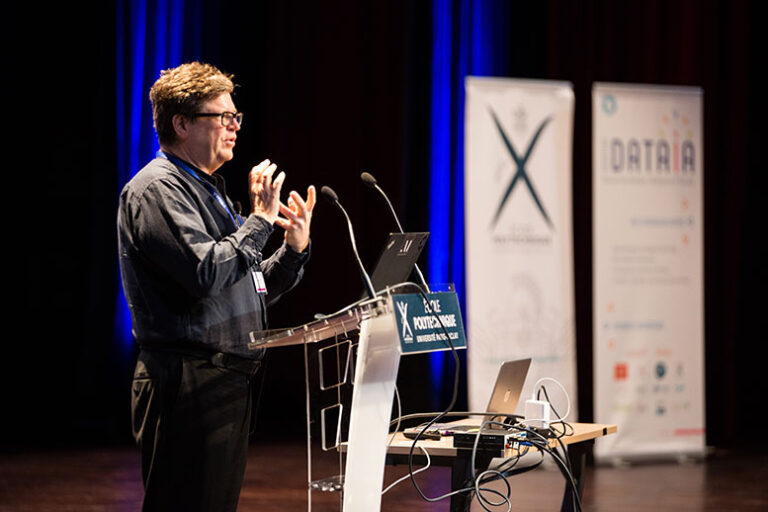 Yann LeCun speaking in a conference