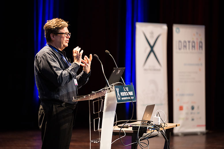 Yann LeCun speaking in a conference