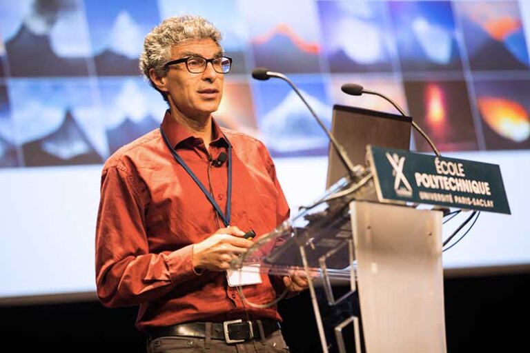 Yoshua Bengio speaking at a conference